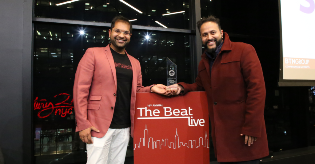 Spotnana Founder and CEO Sarosh Waghmar (right) and Co-Founder and CTO Shikhar Agarwal accept The Beat Live Reader's Choice Award.